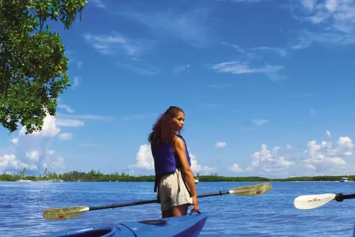 a couple preparing to go kayak