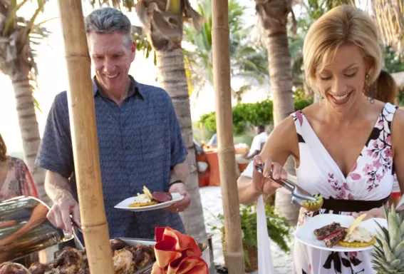 an elderly couple grabing a bite to eat